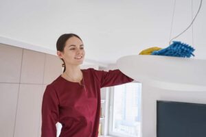 How do you clean a high ceiling light fixture?
