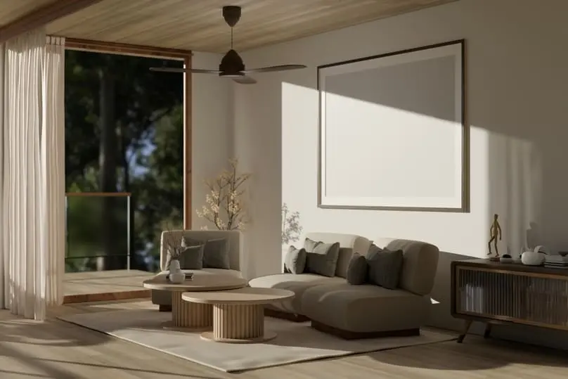 A modern living room with a ceiling fan, a perfect setting for tips on how to clean ceiling fans.